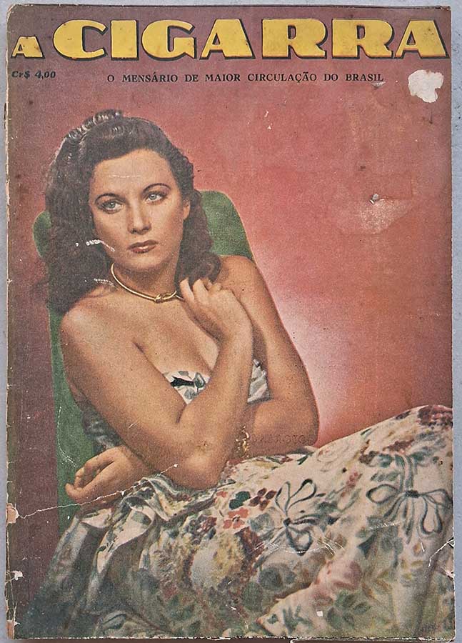 Revista A Cigarra sem a numeração.  Revistas antigas de contos, reportagens e propagandas da época. Capa: Maria Canalle.  Editora: O Cruzeiro.  Edição: Maio/1949. 