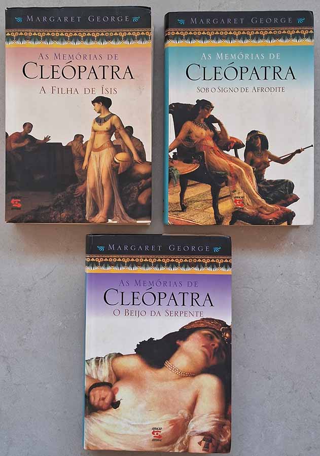 As Memórias de Cleópatra.  Trilogia completa; coleção completa em 3 volumes.  Autor: Margaret George.  Livros Usados.  Volumes: 1. A Filha de Ísis; 2. Sob o Signo de Afrodite e 3. O Beijo da Serpente.