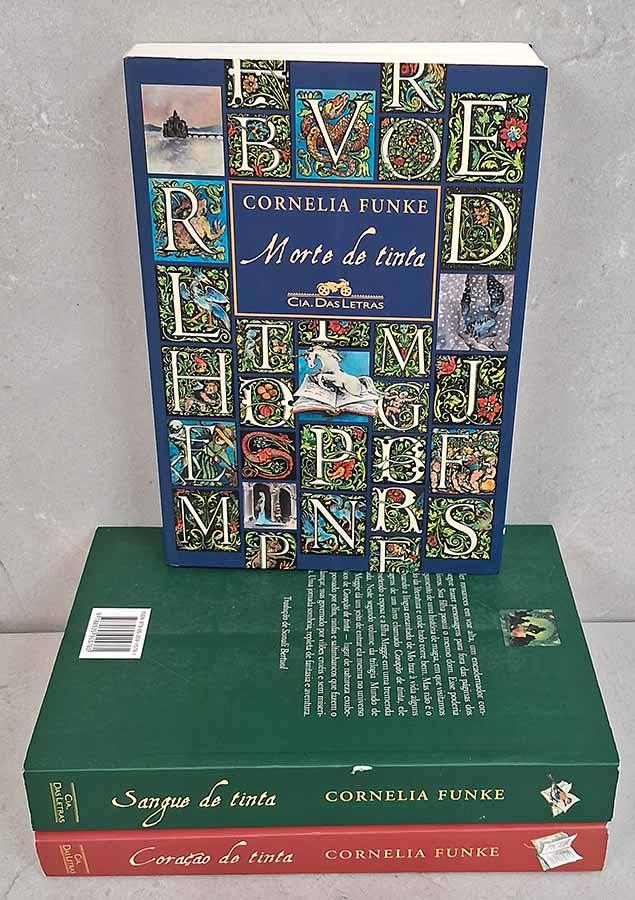 Coração de Tinta com os 3 Volumes.  Autor: Cornelia Funke. Títulos que compõem esta trilogia:  Coração de Tinta; Sangue de Tinta; Morte de Tinta. 